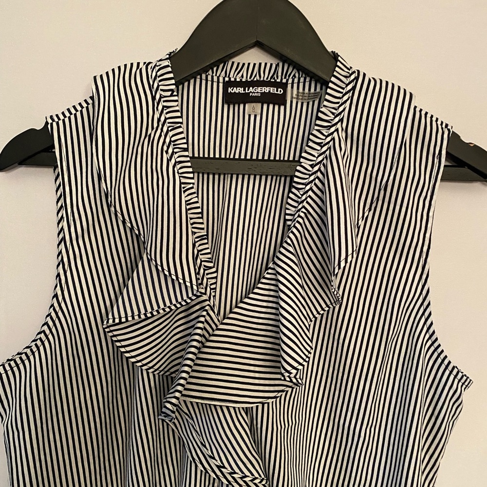 Karl Lagerfield, Paris women’s size, large sleeveless, button-down ruffle blouse